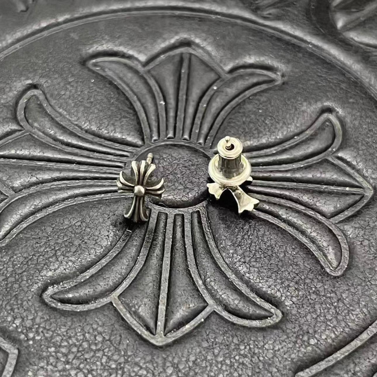 Cross Stud Earrings™