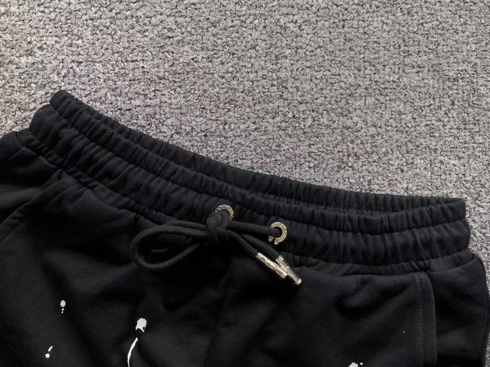 White Leather Cross Paint Drip Sweatshorts™