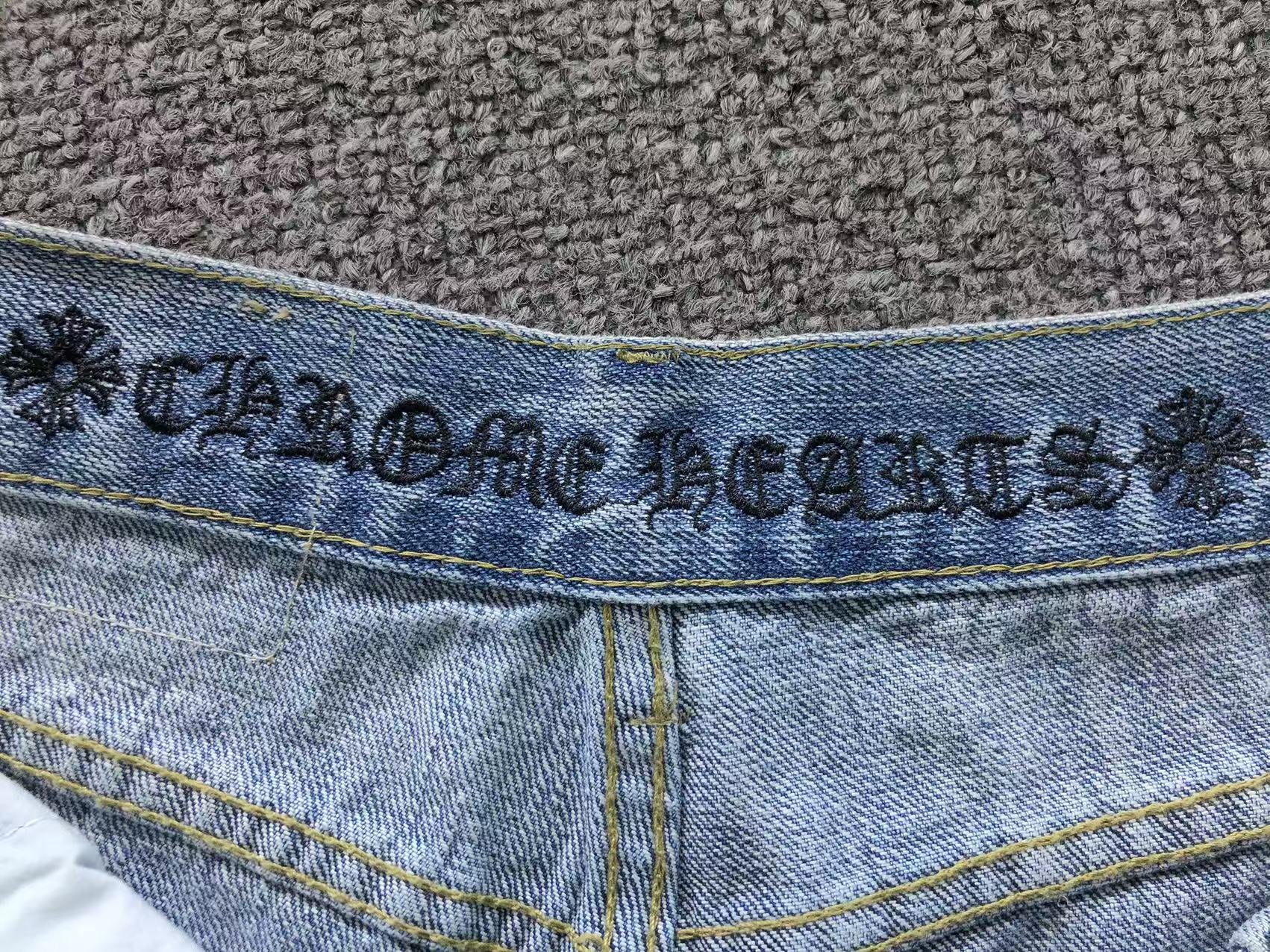 Black Leather Cross Patch Denim Jeans™