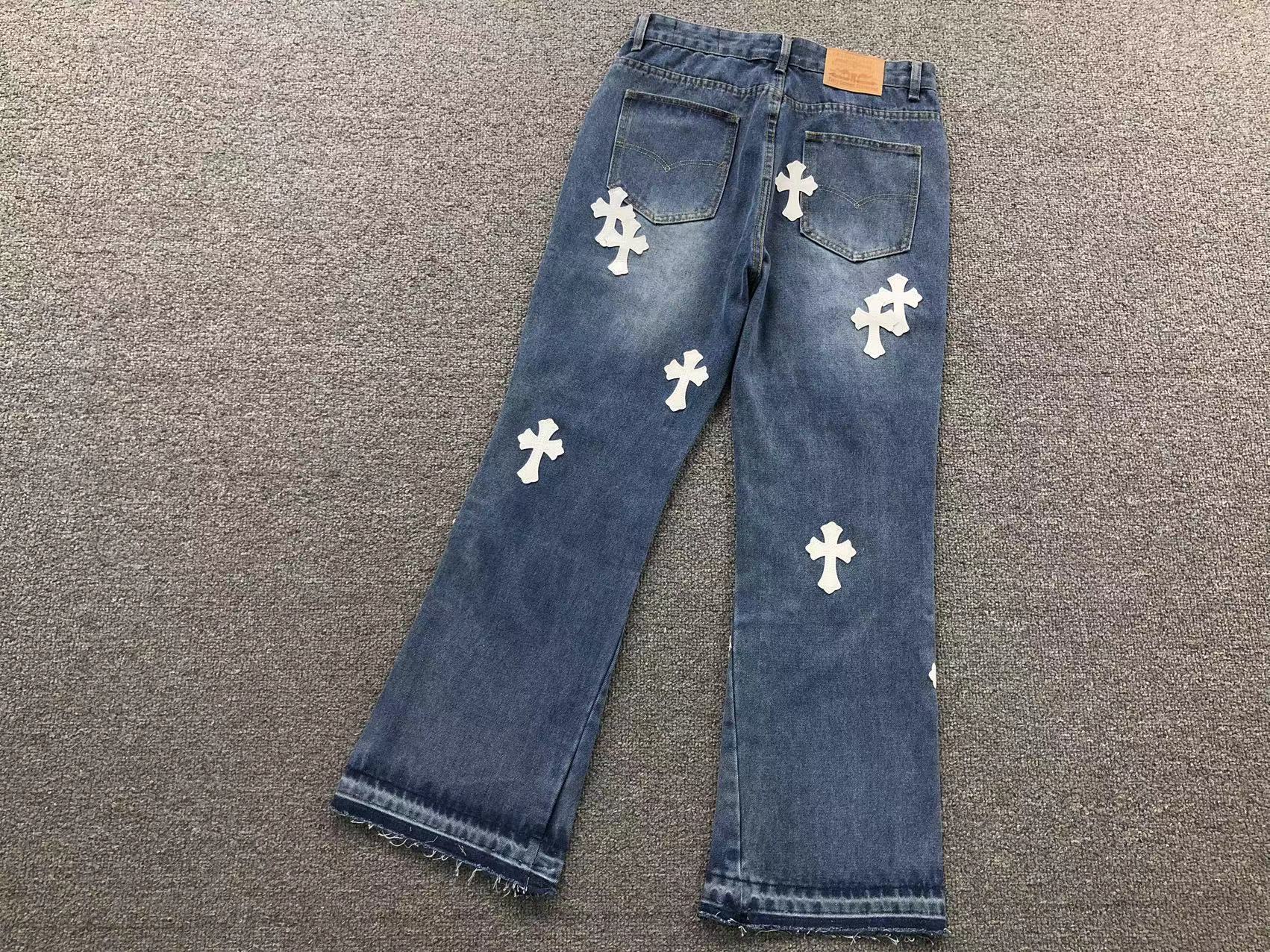 White Cross Patch Distressed Denim Jeans™