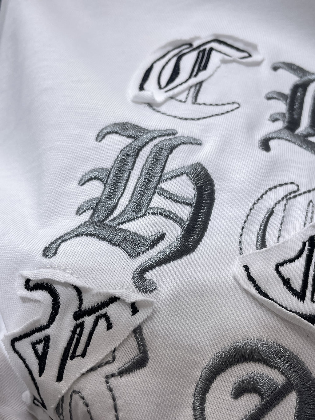 Monochrome Letter Patch White T-Shirt™