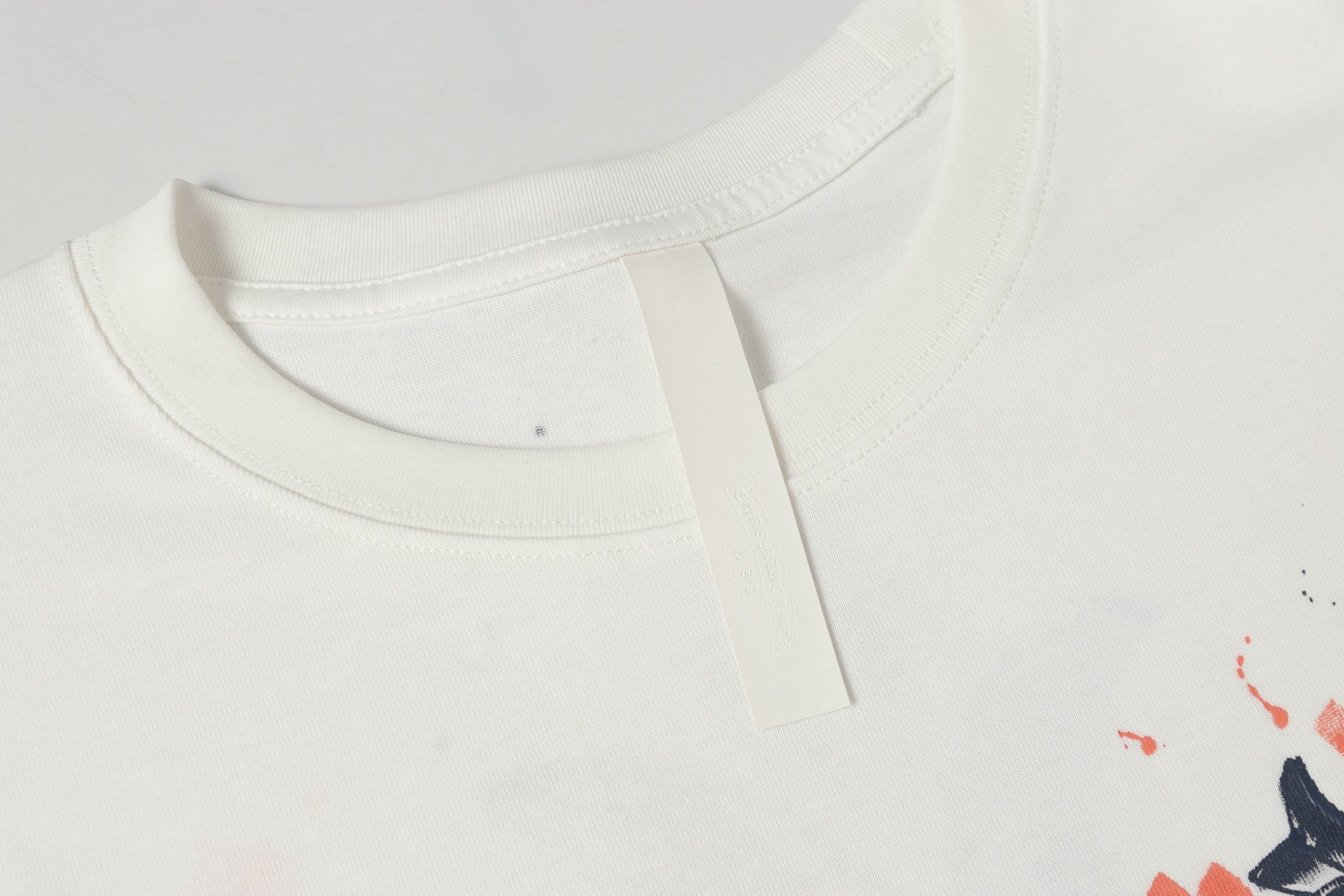 Brushstroke Cross Graphic White T-Shirt™