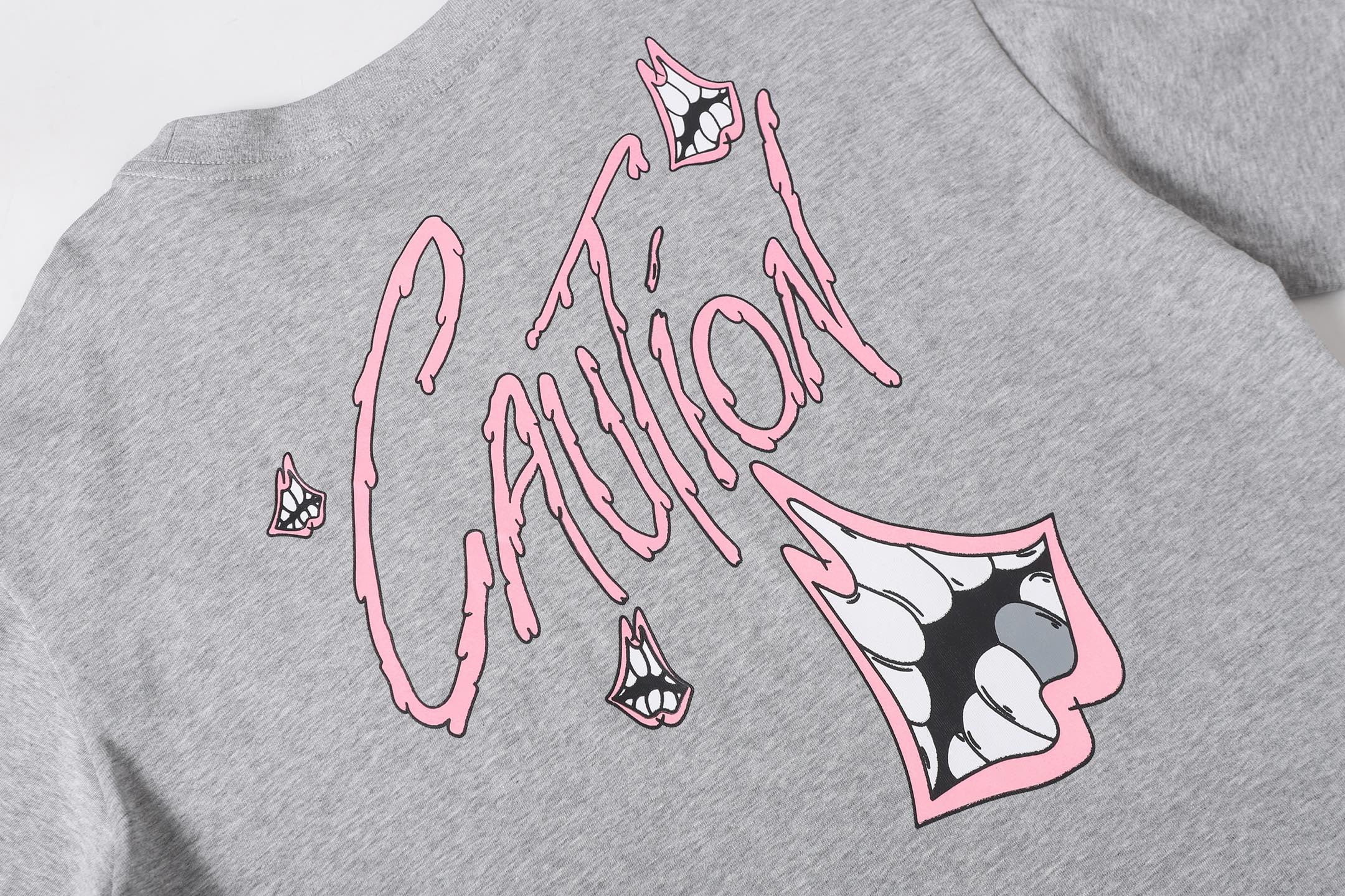 Pink Caution Graphic Grey T-Shirt™