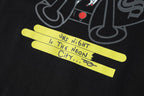 Neon Spray Paint Character Black T-Shirt™