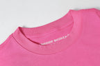 Checker Cross Vanity Affair Pink T-Shirt™