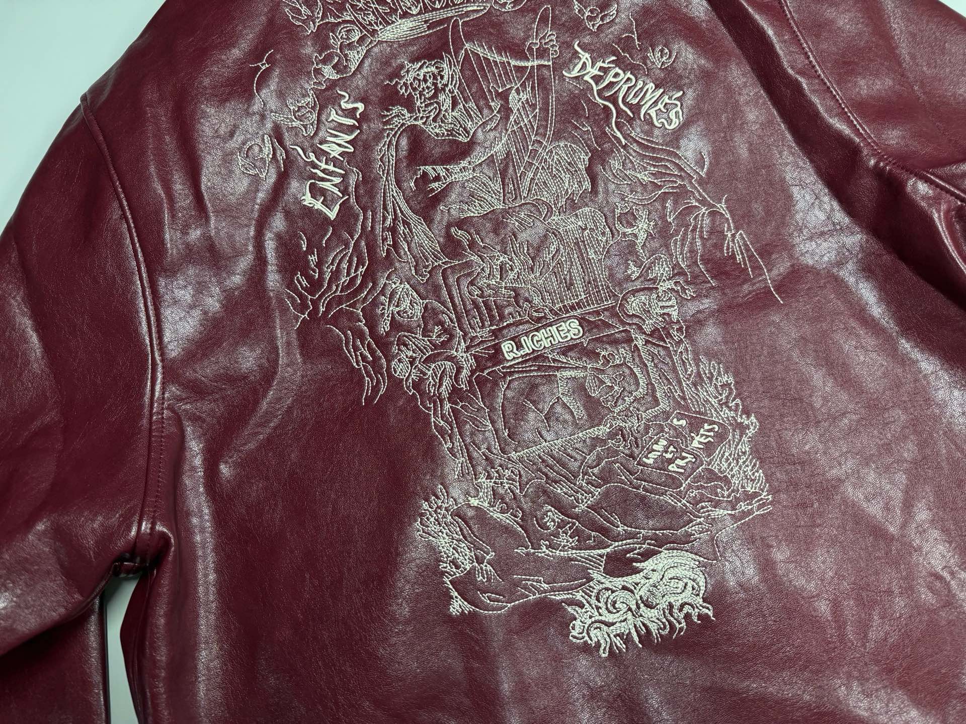 ER* Embroidered Graphic Burgundy Leather Jacket™