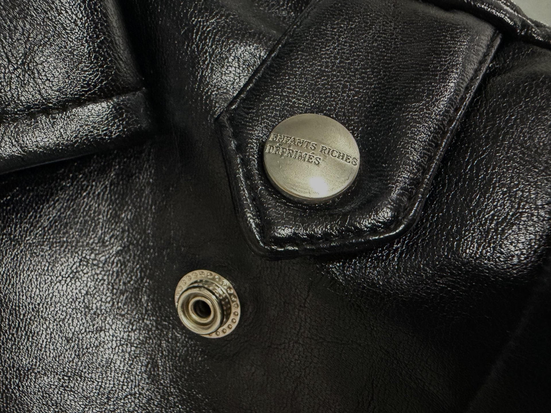 ER* Embroidered Graphic Black Leather Jacket™