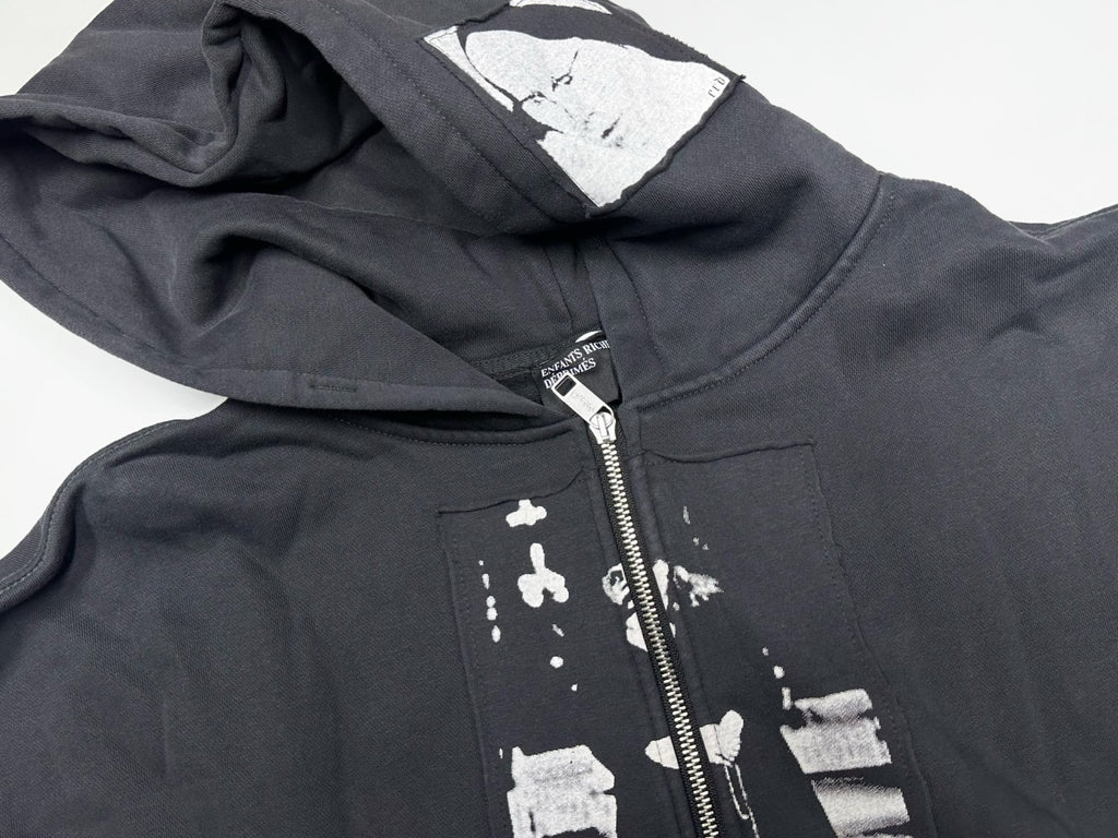 ER* Artist Defends Washed Black Zip Hoodie™