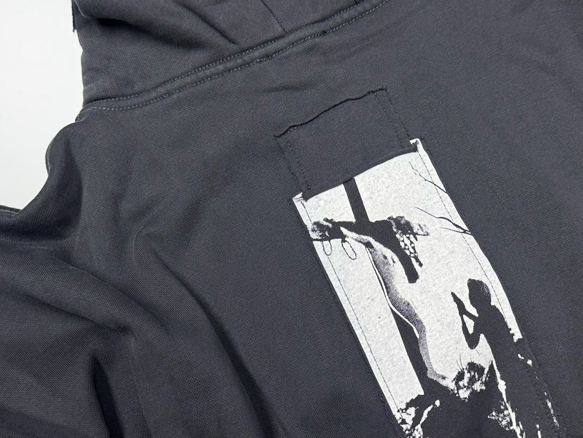 ER* Artist Defends Washed Black Zip Hoodie™