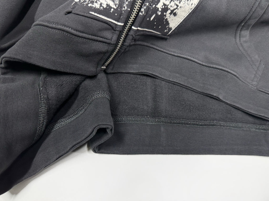 ER* Artist Defends Washed Black Zip Hoodie™