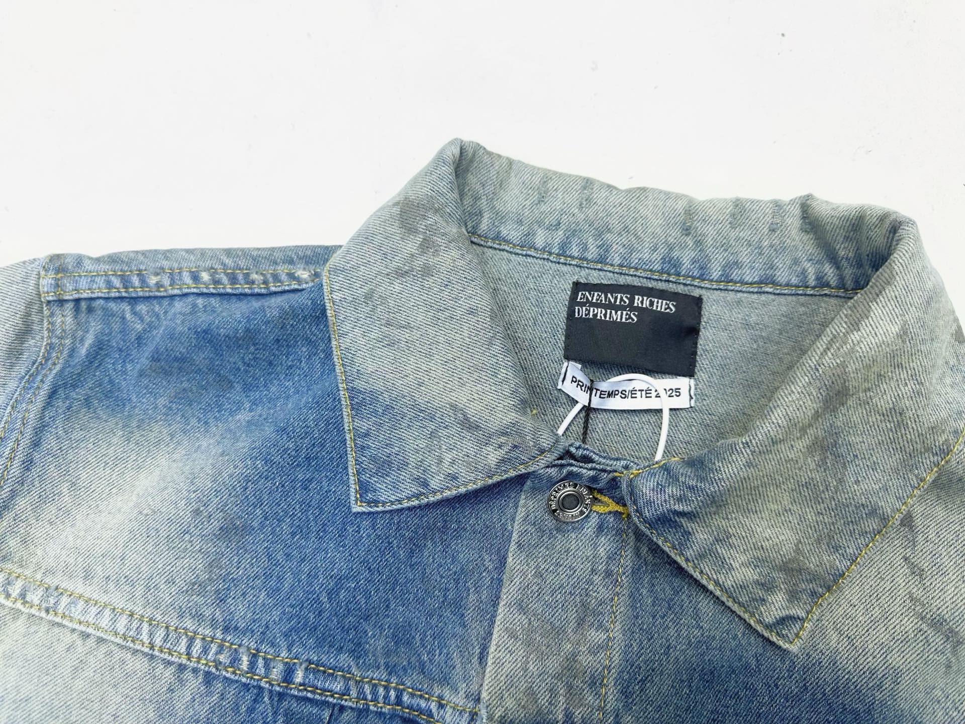 ER* Stained Light Wash Denim Jacket™