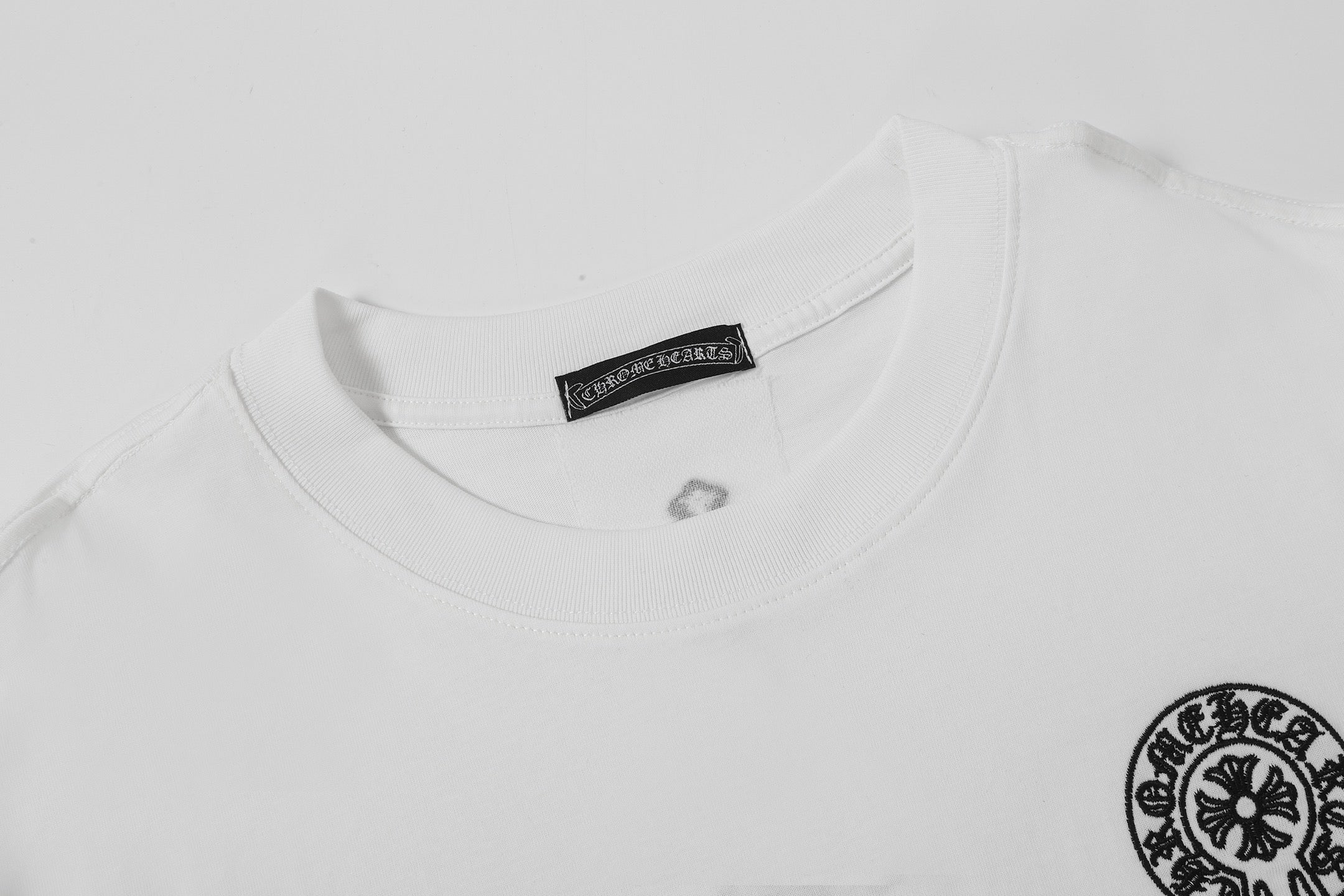 Vertical Cross Horseshoe Logo White T-Shirt™