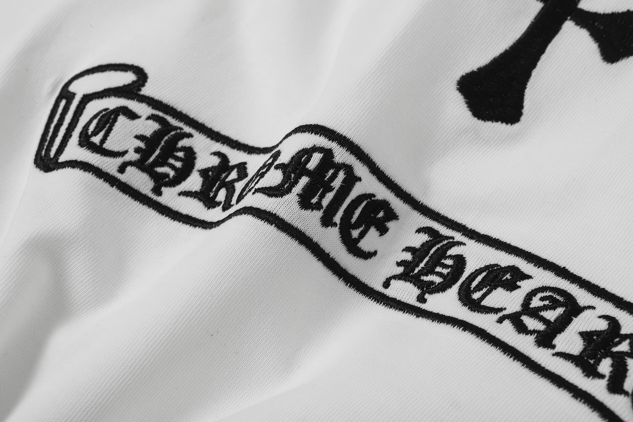 Vertical Cross Horseshoe Logo White T-Shirt™
