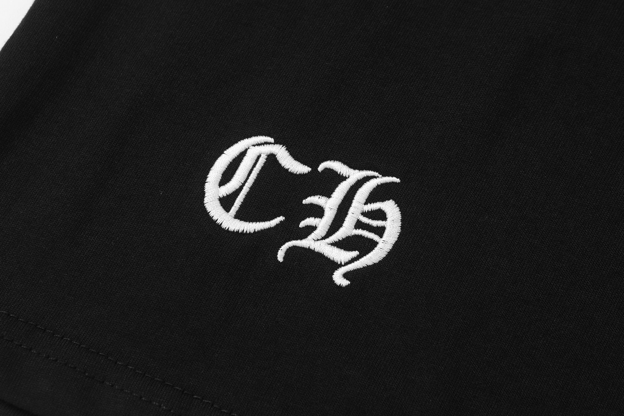 Vertical Cross Horseshoe Logo Black T-Shirt™