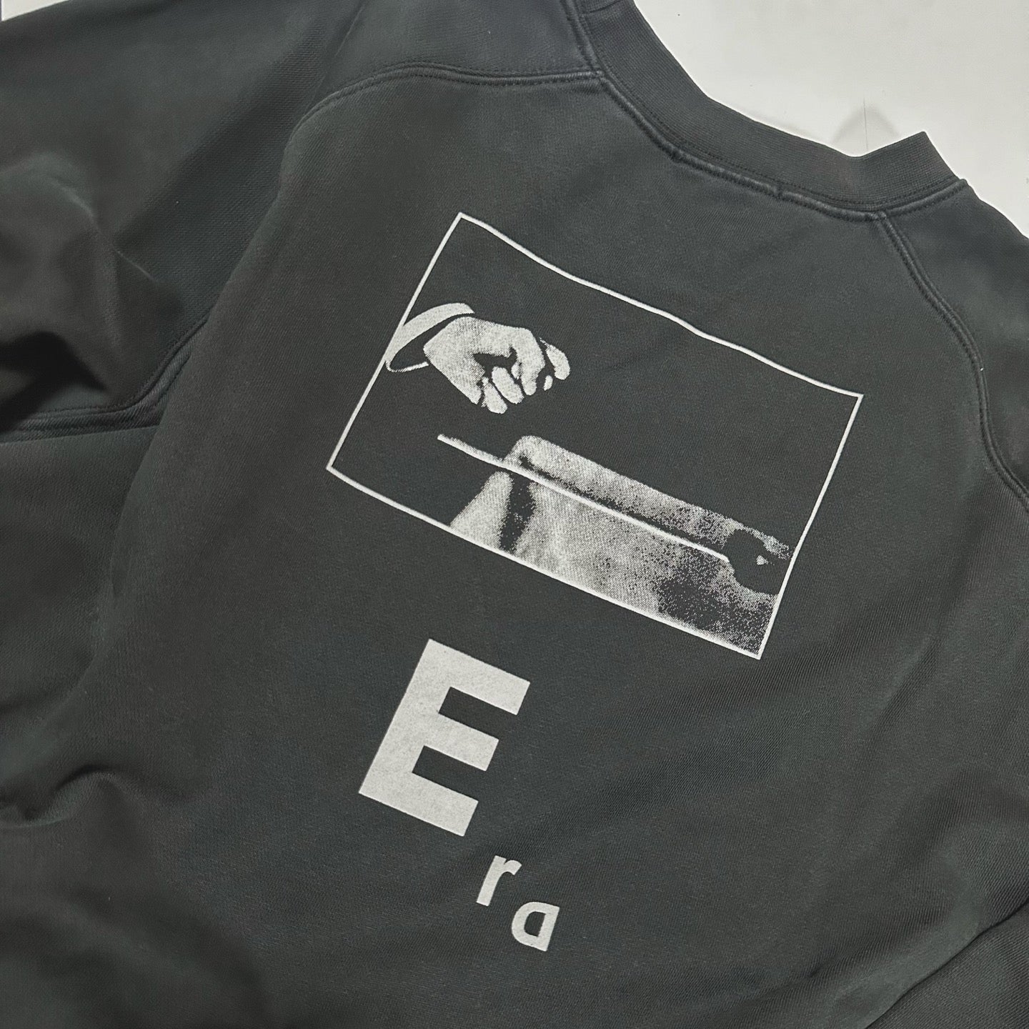 ER* Typography Portrait Washed Black Sweater™