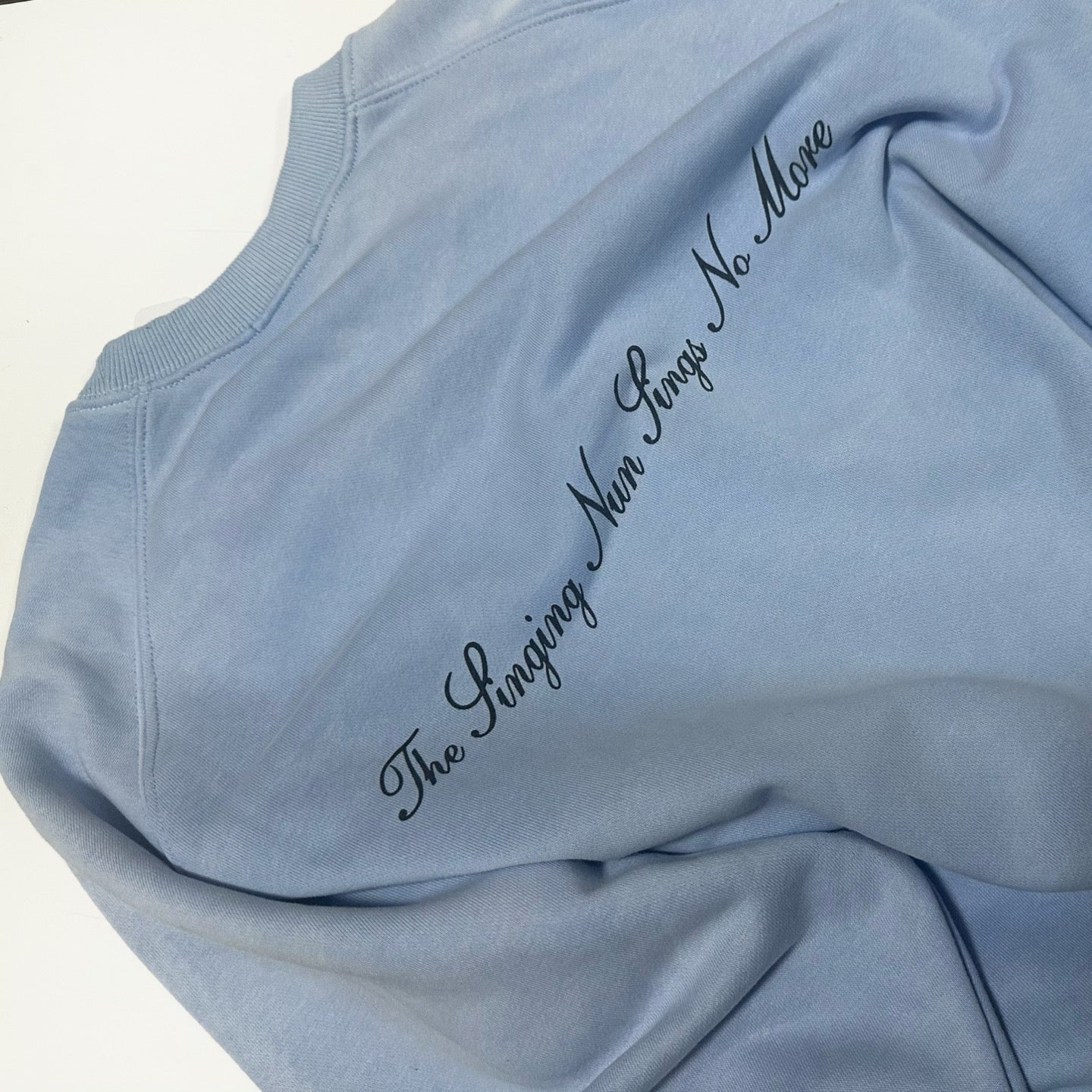 ER* Singing Nun Light Blue Sweater™