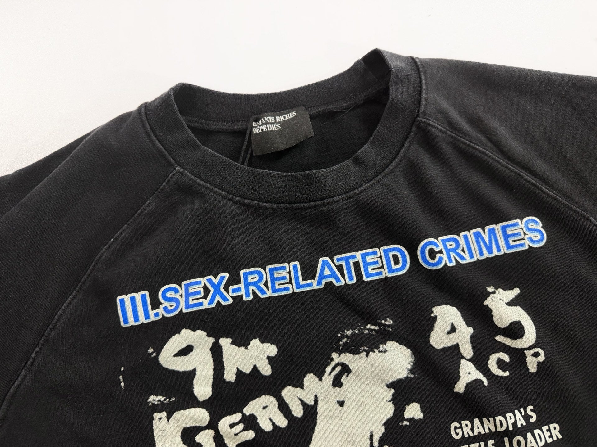 ER* S*x Related Crimes Washed Black Sweater™
