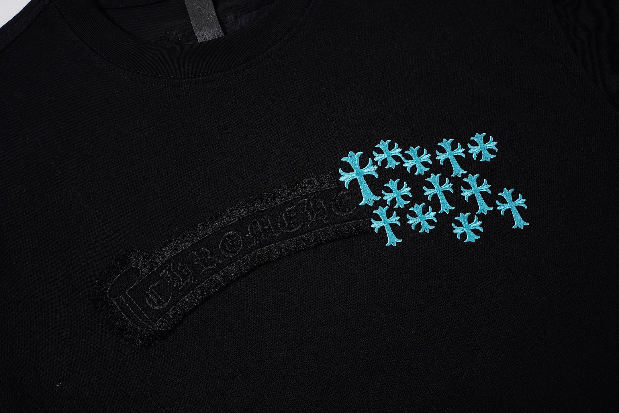 Turquoise Cross Scatter Black T-Shirt™
