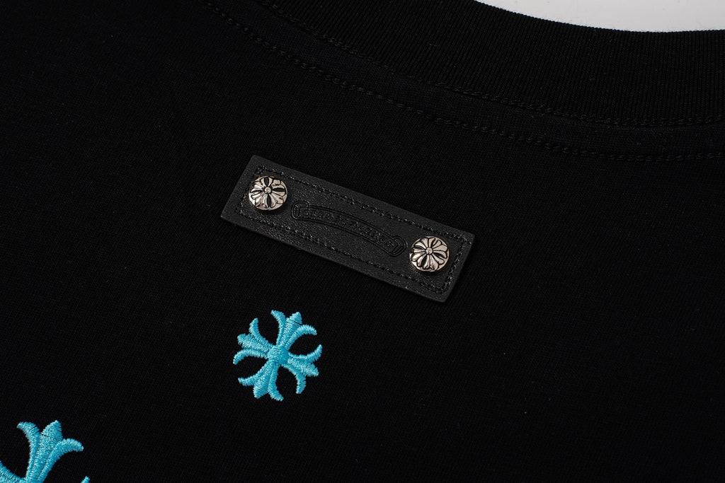 Turquoise Cross Scatter Black T-Shirt™