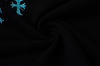 Turquoise Cross Scatter Black T-Shirt™