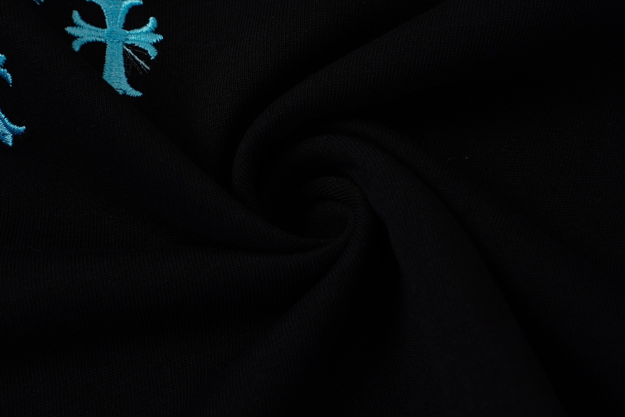 Turquoise Cross Scatter Black T-Shirt™