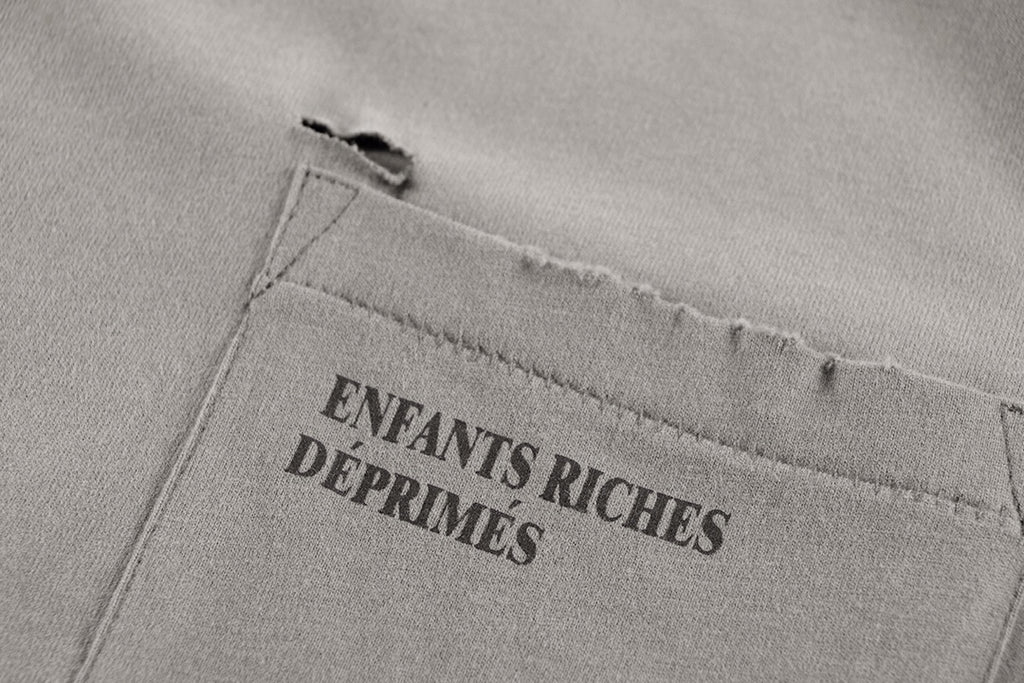 ER* Distressed Pocket Beige T-Shirt™*