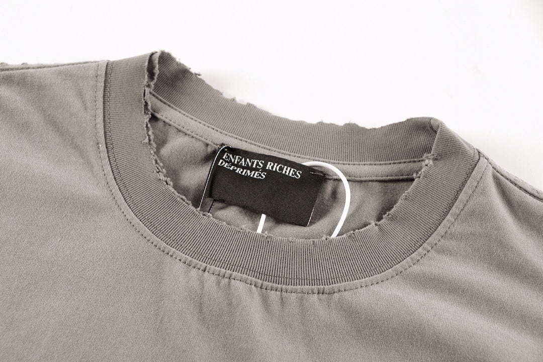 ER* Distressed Pocket Beige T-Shirt™*