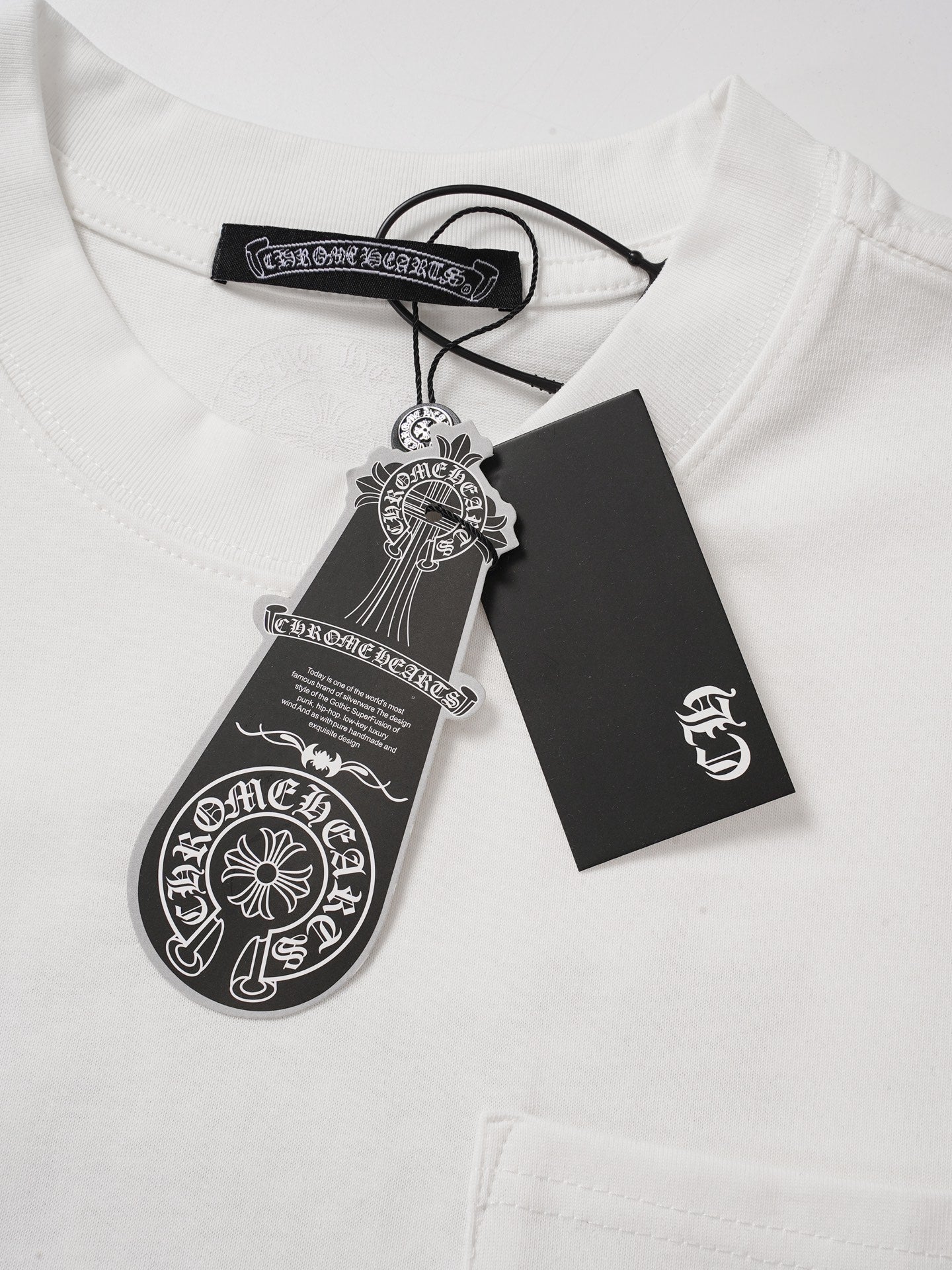 Black Horseshoe Ornate Cross White T-Shirt™