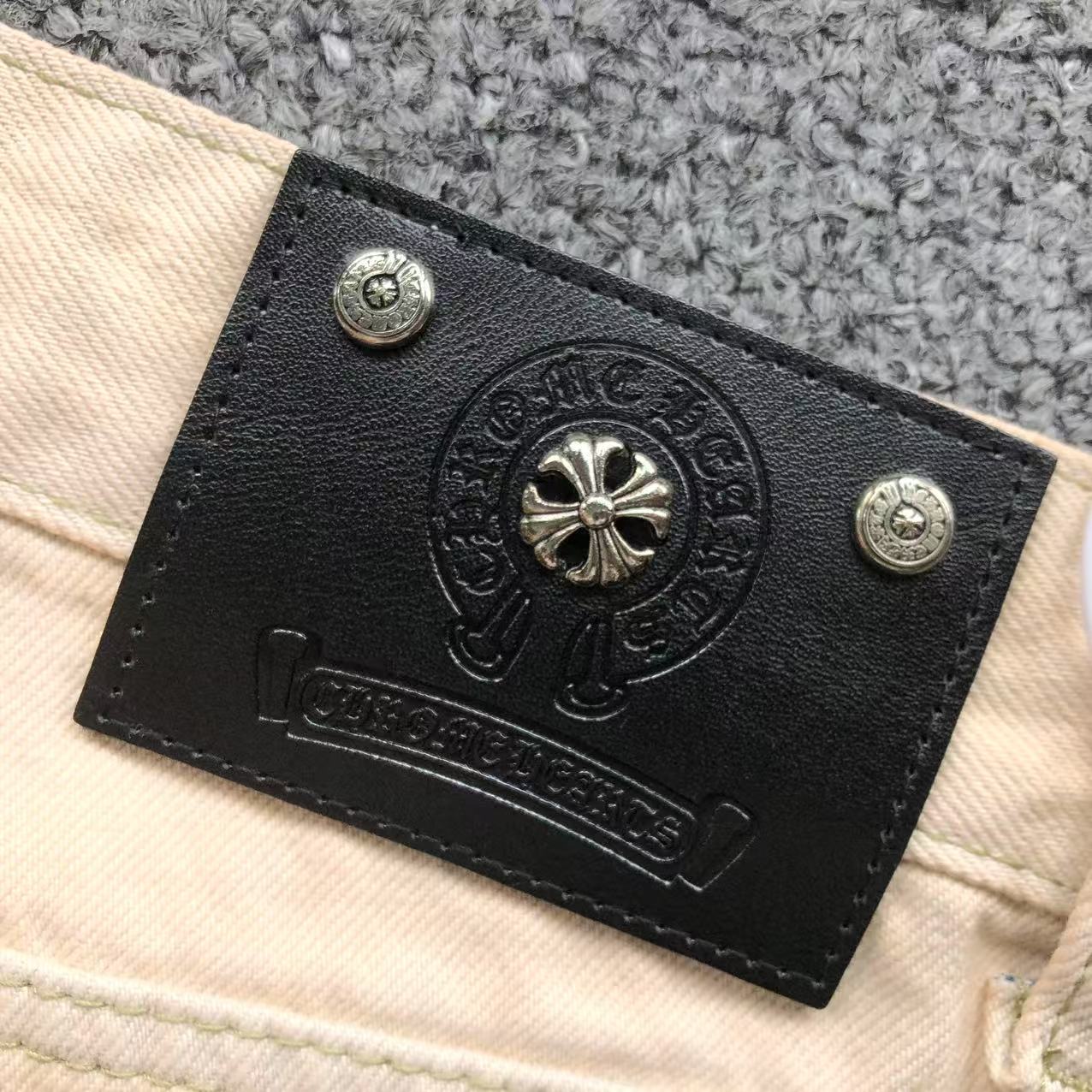 White Brown & Orange Cross Patch Cream Jeans™