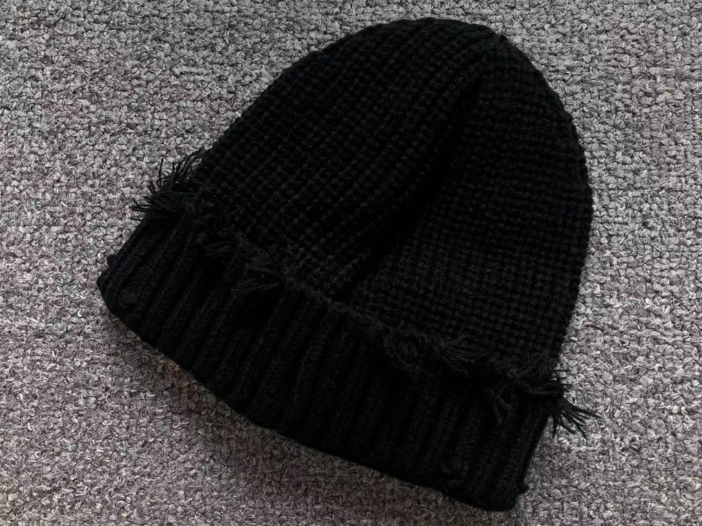 Torn Knit Beanie™