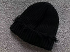 Torn Knit Beanie™
