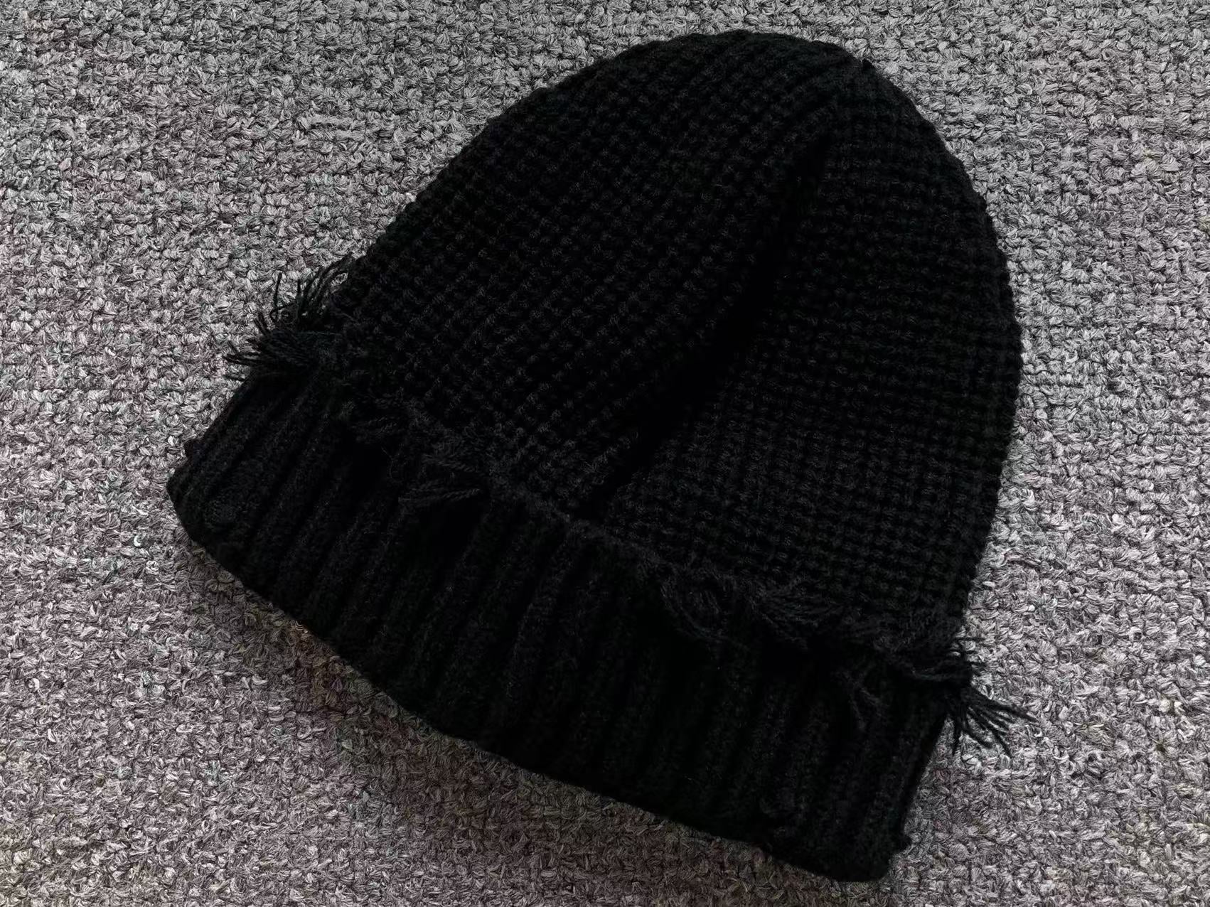 Torn Knit Beanie™