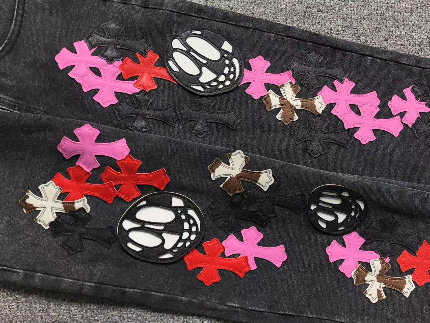 Multi Color Cross & Smiley Patch Denim Jeans™