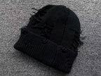 Leather & Metallic Cross Torn Knit Beanie™