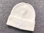 Double Leather Cross Wool Beanie™