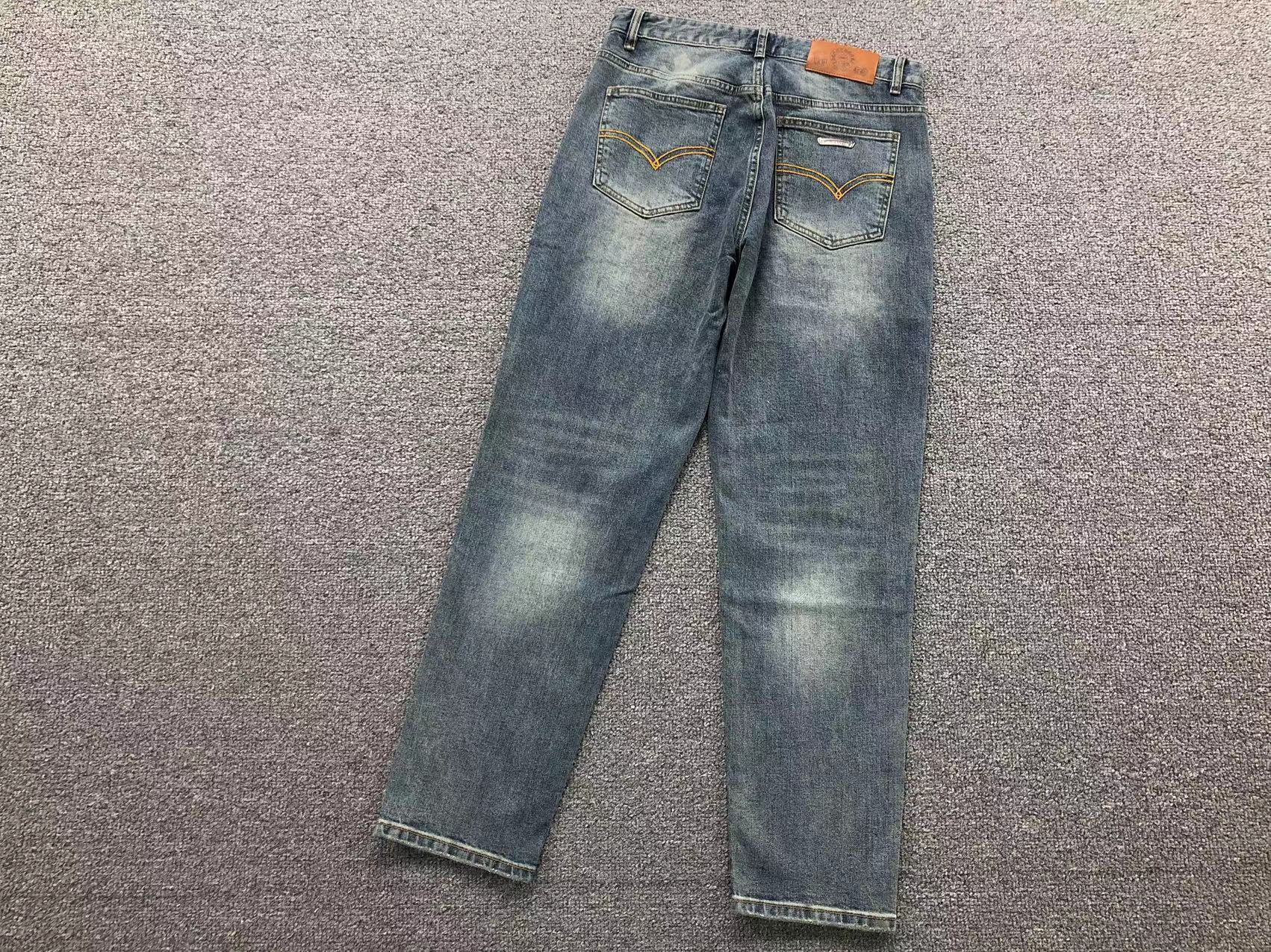 Washed Frayed Cross Patch Jeans™
