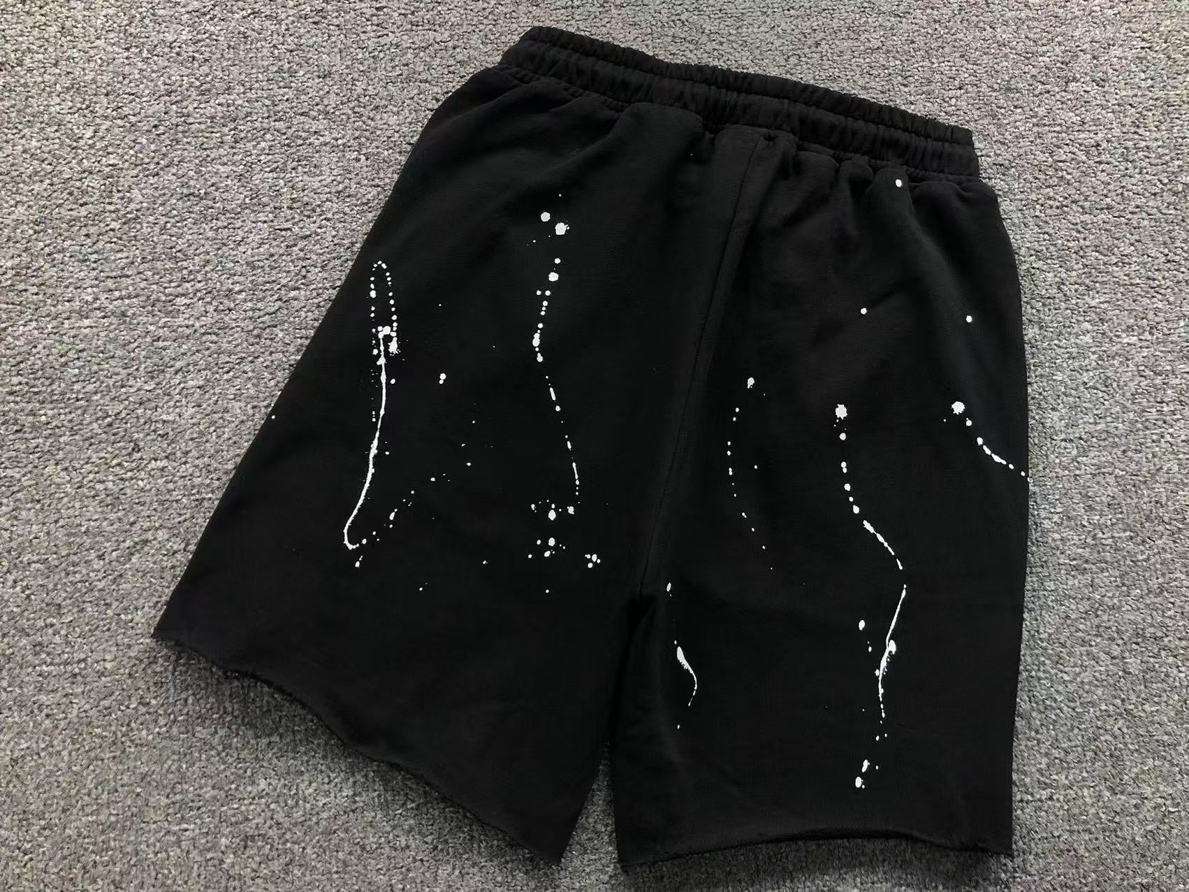 White Leather Cross Paint Drip Sweatshorts™