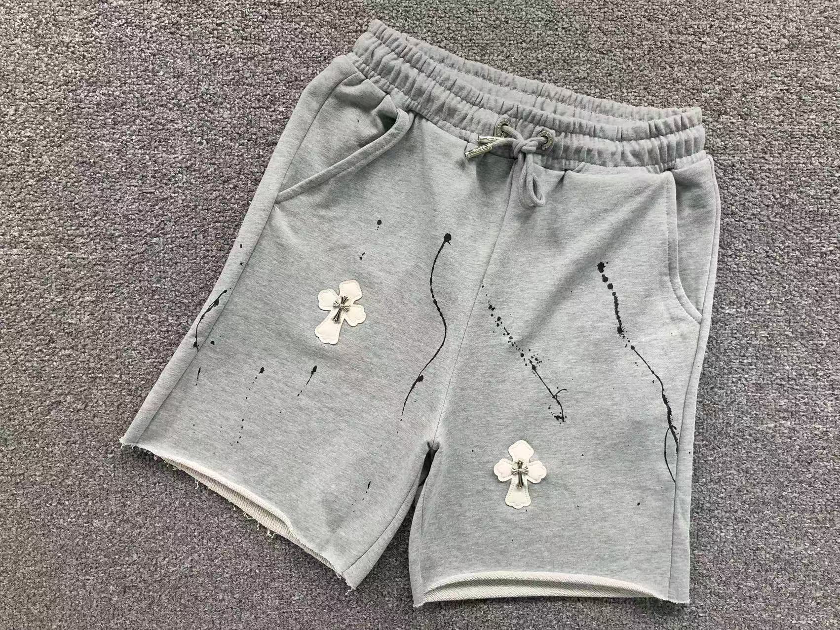 White Leather Cross Paint Drip Sweatshorts™