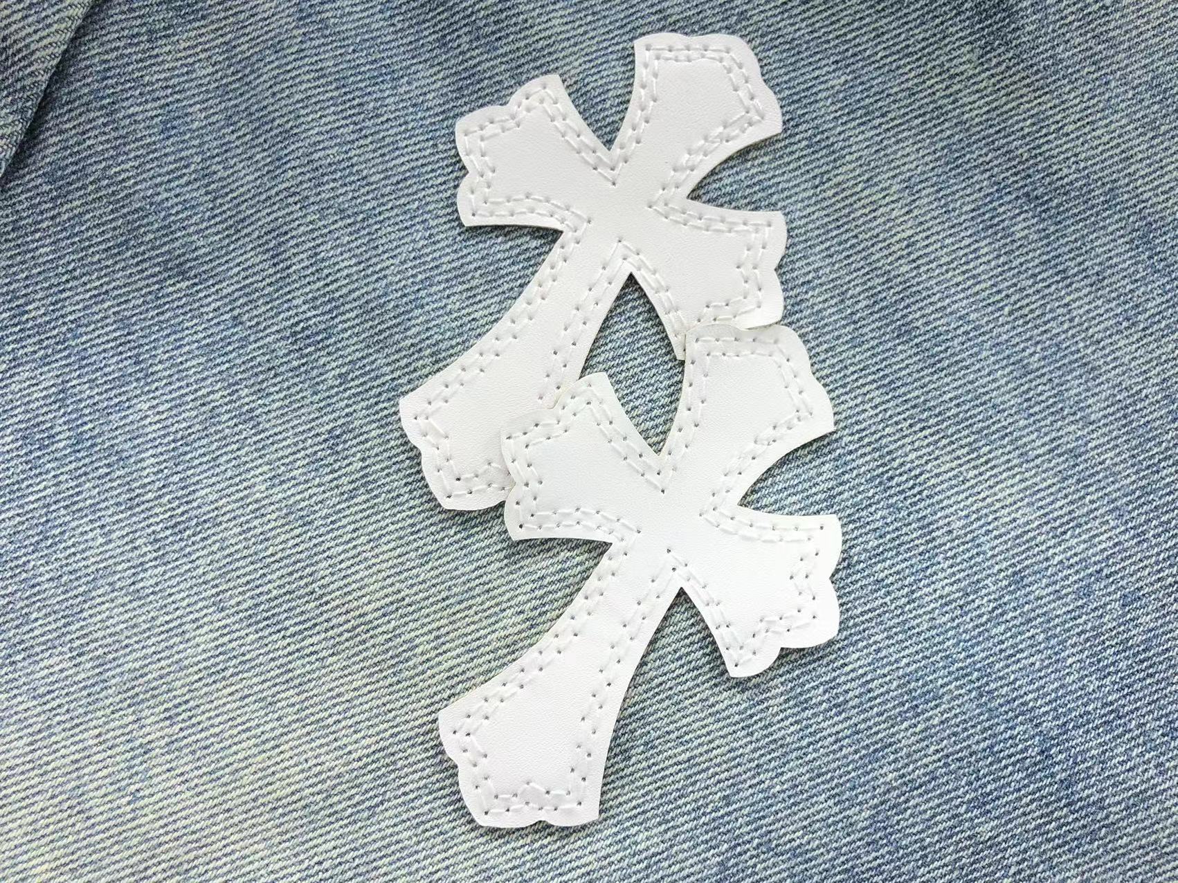 White Cross Patch Mixed-Denim Jeans™