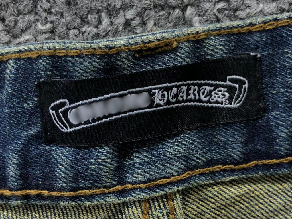 Washed Frayed Cross Patch Jeans™