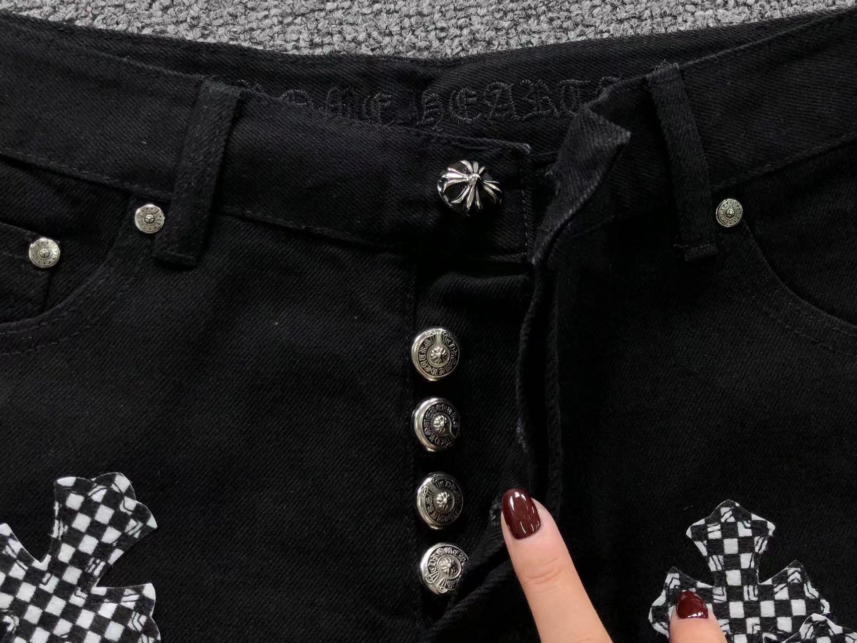 Checkered & Pink Cross Patch Black Jeans™