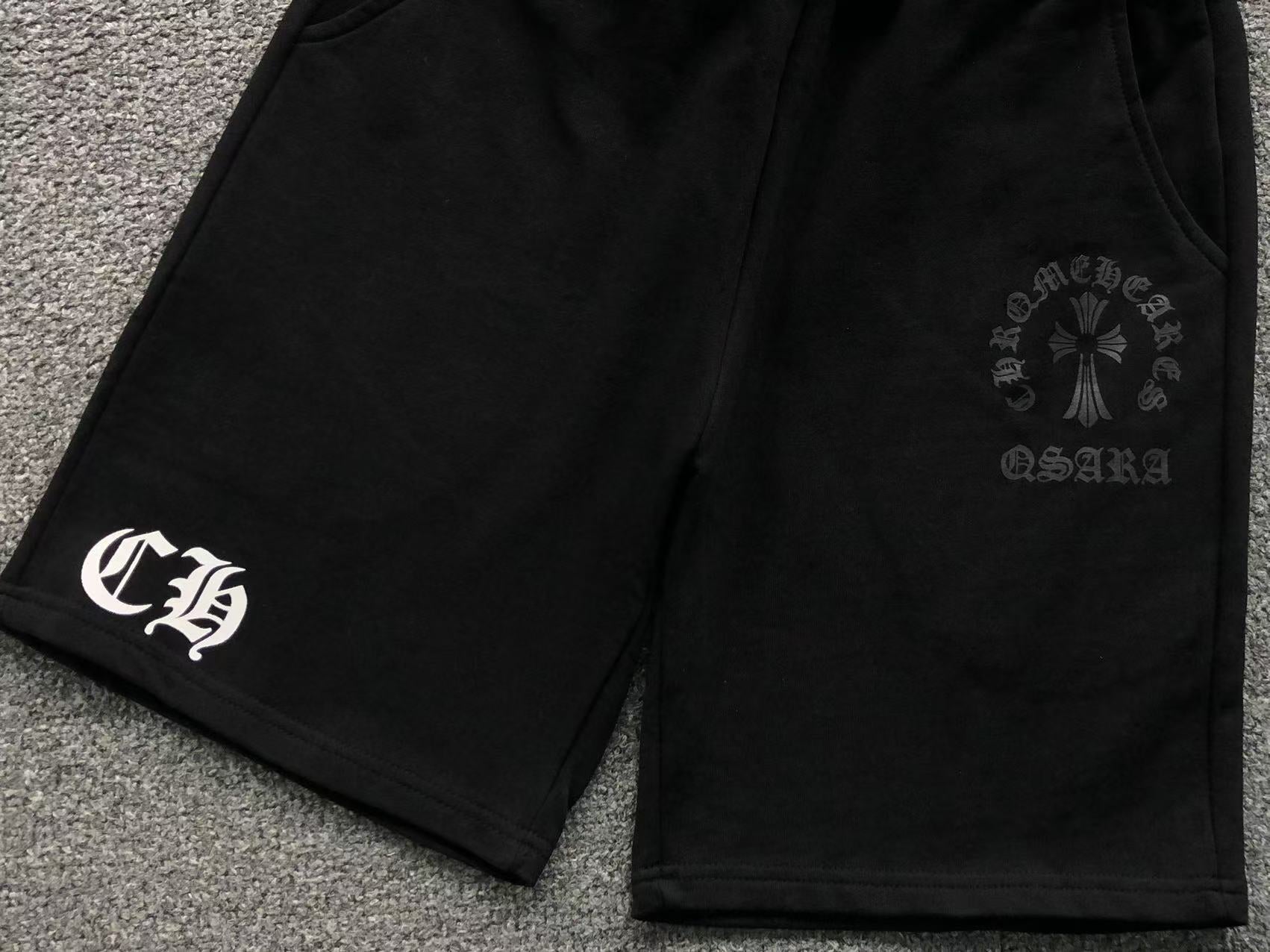 Cross Symbol Black Sweatshorts™