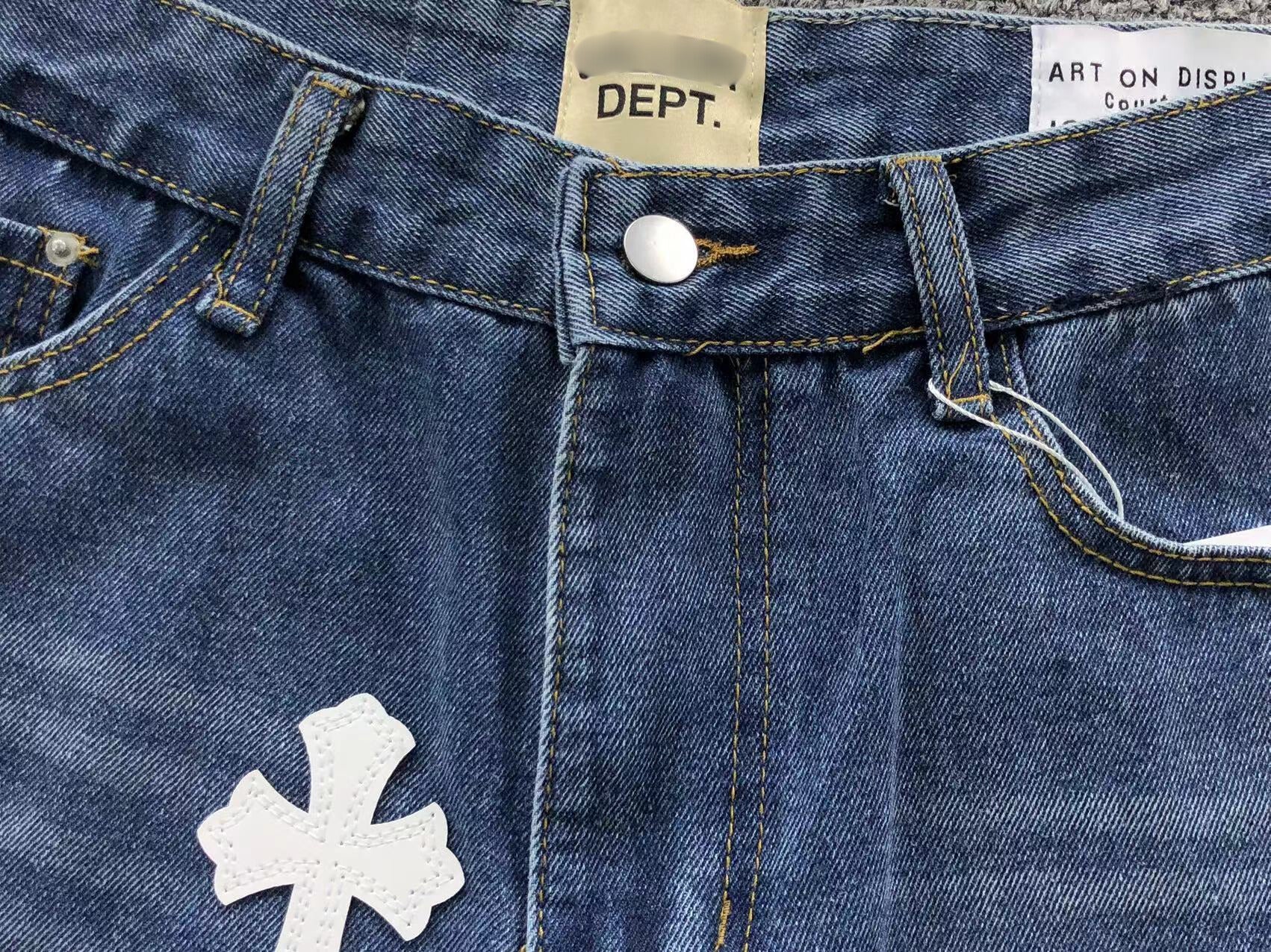 White Cross Patch Distressed Denim Jeans™