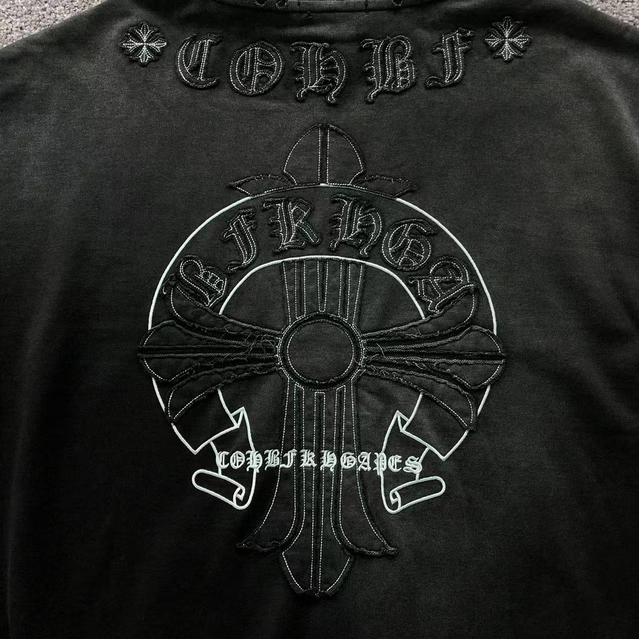 Cross & Horse Shoe Logo Torn Fabric Hoodie™