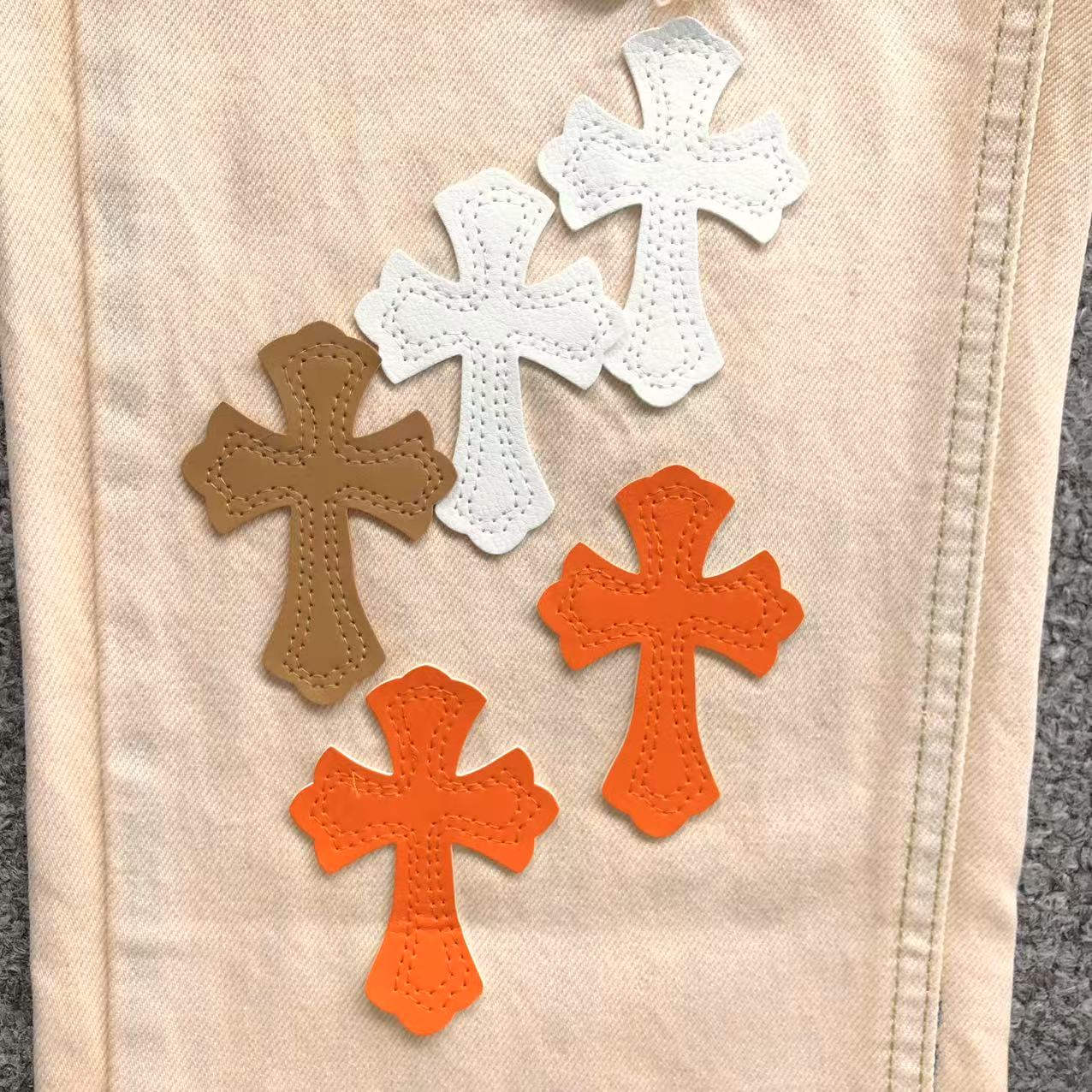 White Brown & Orange Cross Patch Cream Jeans™