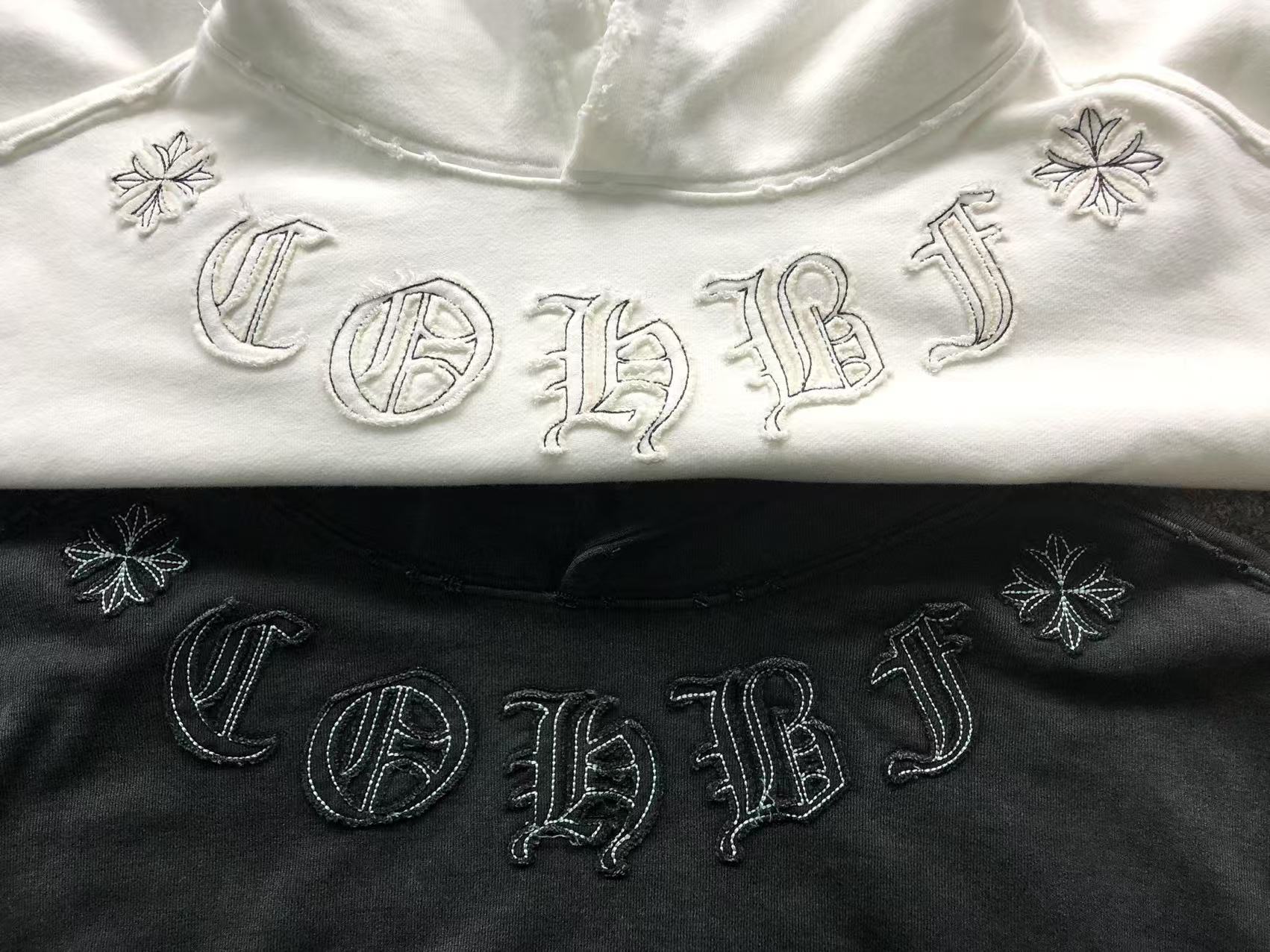 Cross & Horse Shoe Logo Torn Fabric Hoodie™