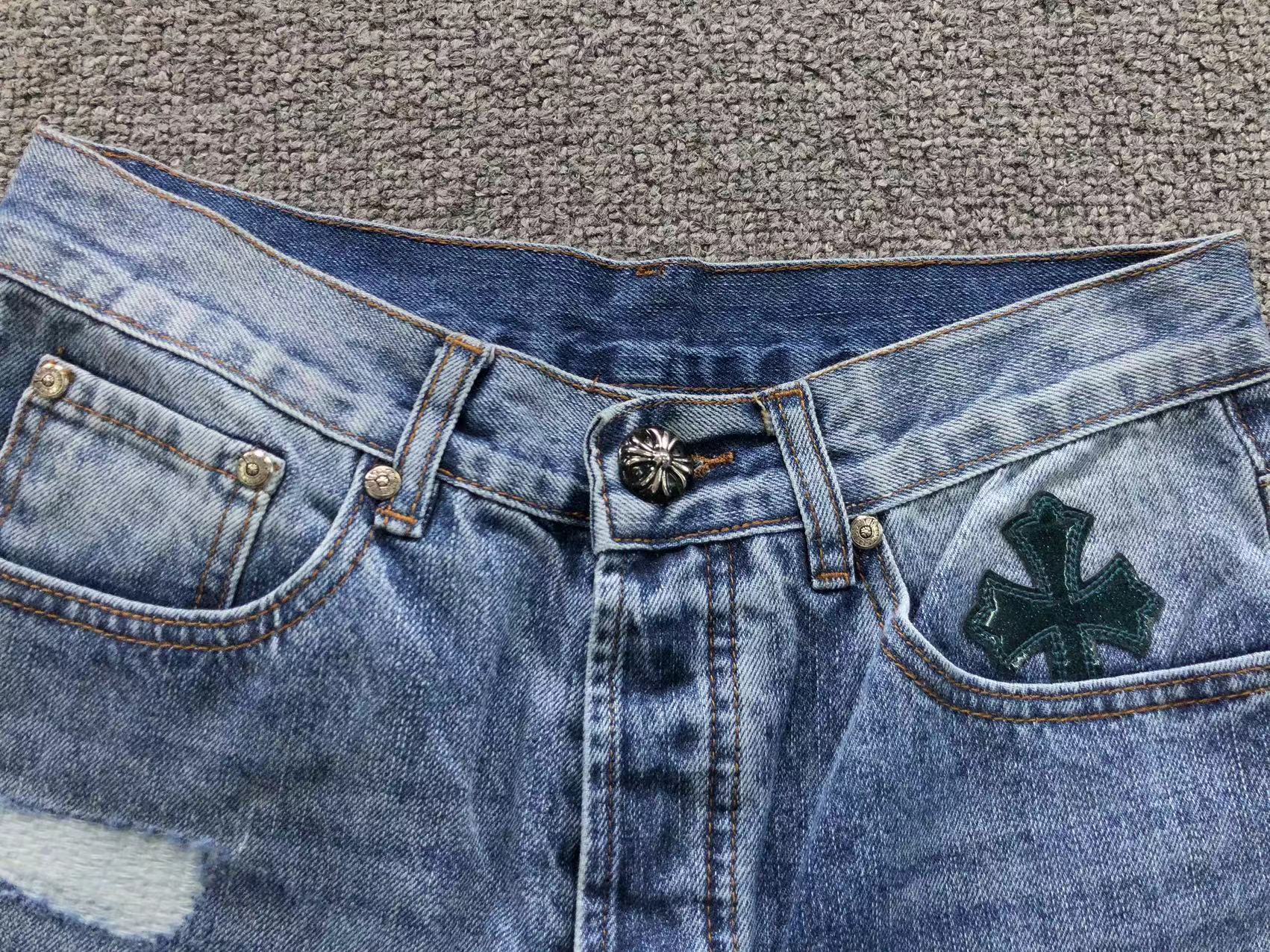 Black Cross Patch Distressed Denim Jeans™