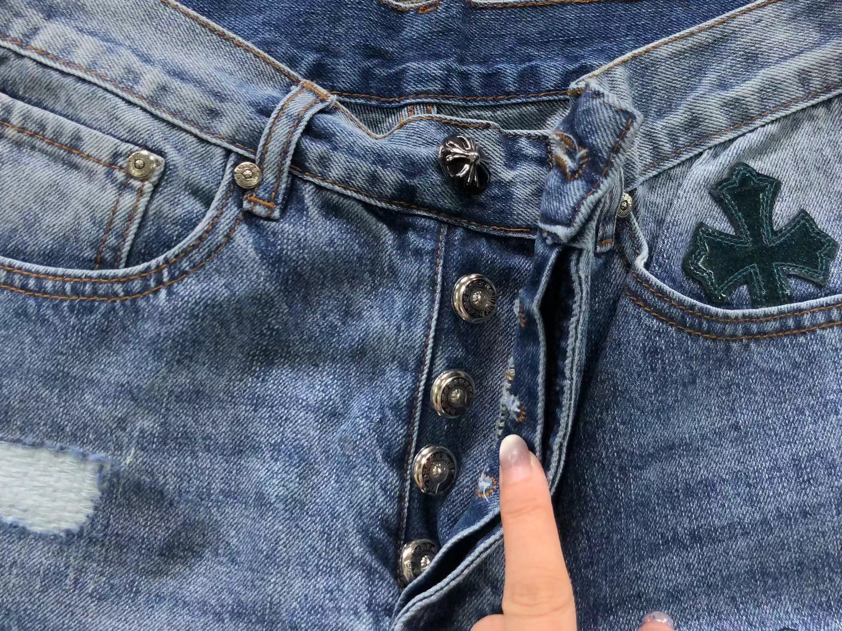 Black Cross Patch Distressed Denim Jeans™