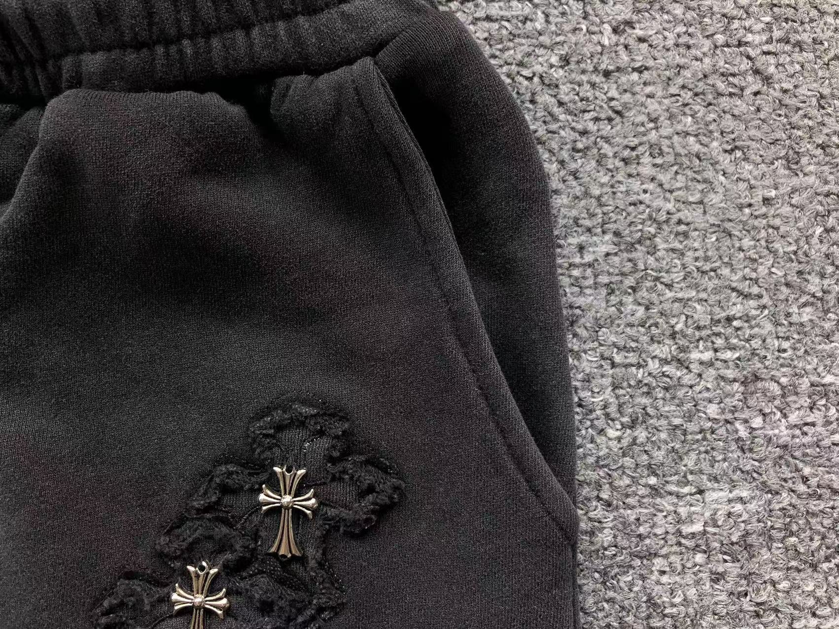 Torn Fabric Metallic Crosses Black Sweatshorts™