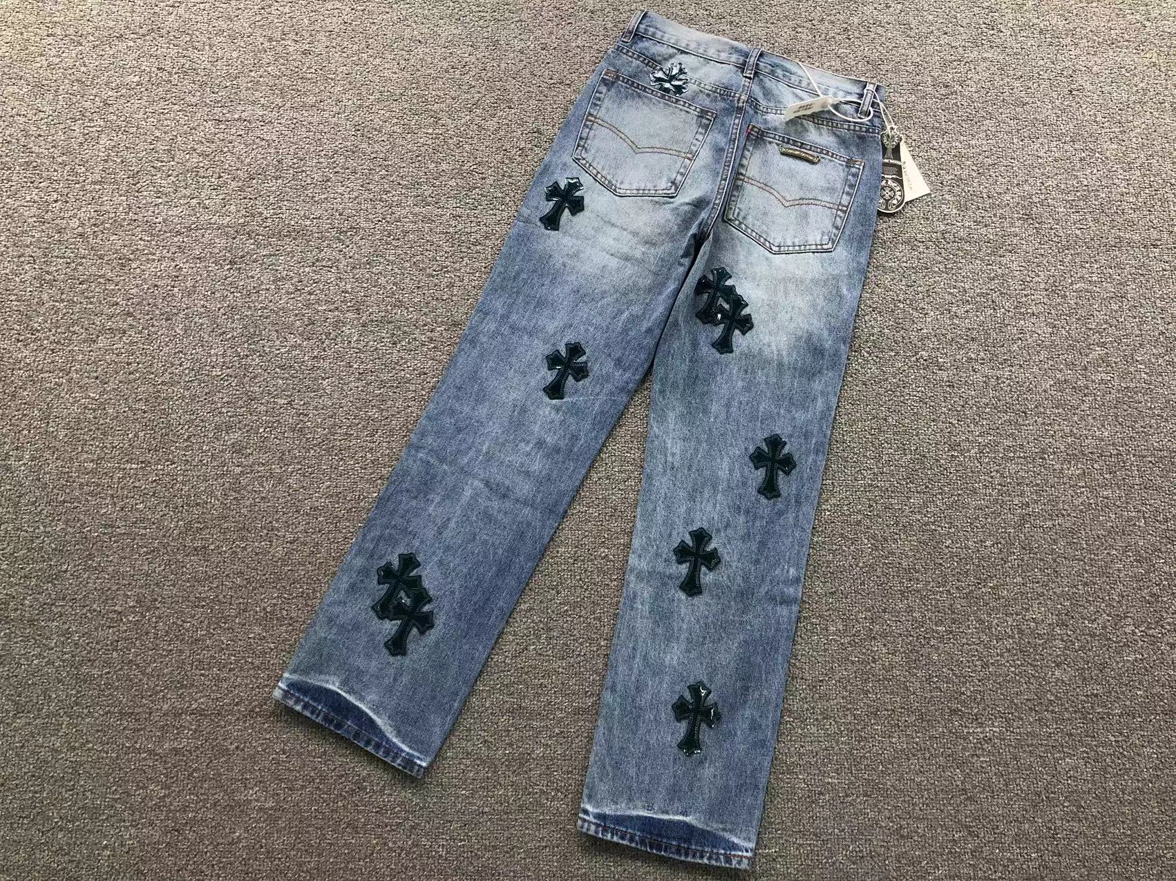Black Cross Patch Distressed Denim Jeans™